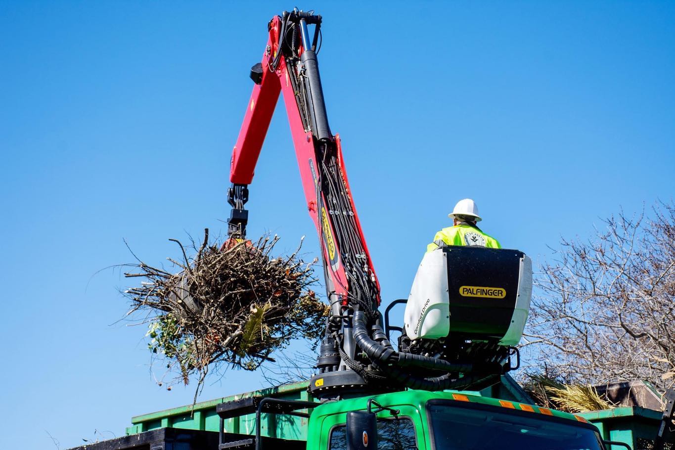 A c5rane collects storm debris